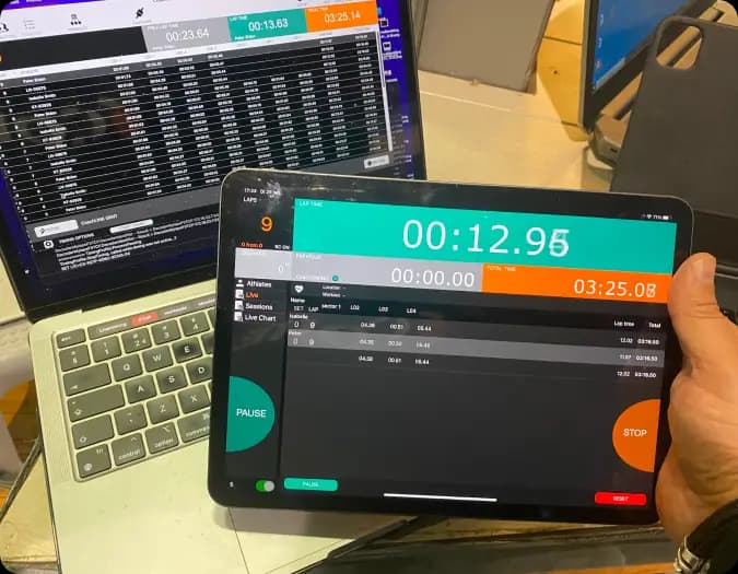 CoachDISPLAY showing live timing results on a large venue screen
